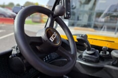 View of a steering wheel from a JCB 514-40 telehandler.